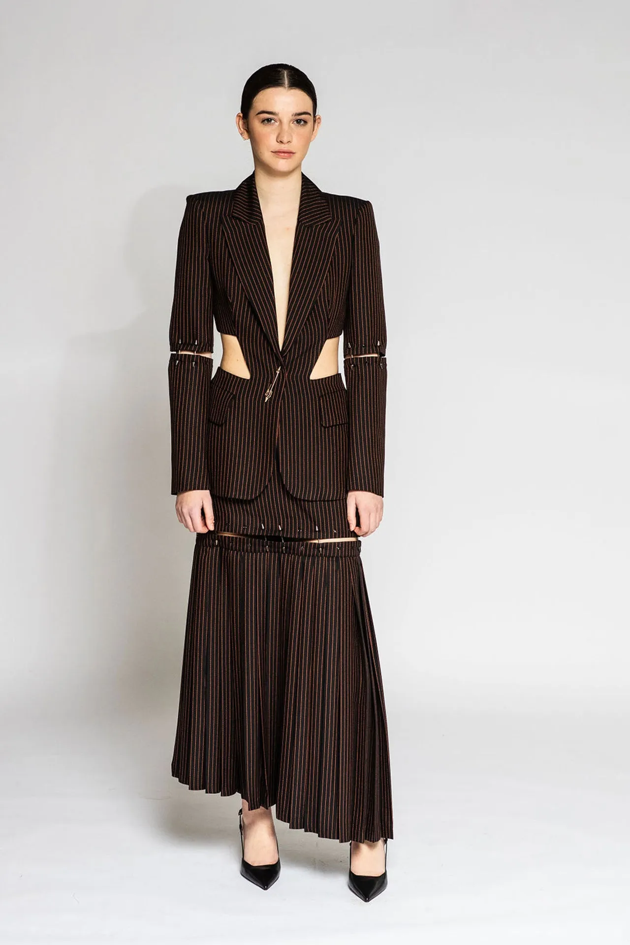Blazer and Pleated Skirt with Cutouts